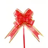 Atacado transfronteiriço 30 flores de casca média, embalagem para presente de Natal, laço de neve, fio de árvore, flor de mão