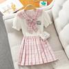 Saia de Uniforme Estilo Faculdade para Meninas Verão Novo Estilo Ocidental Infantil Médio-Grande Verão para Meninas Manga Curta JK Saia Plissada Conjunto de Duas Peças