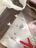 Joyería para Uñas de Campana de Navidad Exquisita Luz de Lujo Mariposa Combinada con Diamantes Dorados para Uñas Decoraciones Populares de Navidad Venta al por Mayor