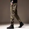Calça jogger casual masculina de design estiloso e corte solto, calça harém única e de nicho, calça de trabalho legal e moderna de marca para homens no outono