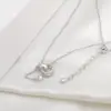 2023 Nova corrente de clavícula de temperamento microincrustada com zircônia, toda cravejada de diamantes, colar de cintura fina, corrente de pescoço com borla da moda, joias para atacado