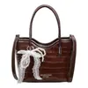Bolsa Feminina Xadrez Nova Outono 2026 Bolsa Saco Retrô Francesa Elegante para o Trabalho Ombro Transversal Bolsa de Mão Tendência