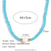 Collar con colgante de temperamento explosivo minoritario europeo y americano, cuentas de acero inoxidable, perla de agua dulce única, cuentas de cristal azul para mujer