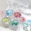 Ins Verano Nuevo Flor de Cinco Pétalos Lentejuelas para Manicura Venta al por Mayor Flores Recortadas Color Caramelo Parches Mixtos para Decoración de Uñas