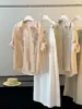 Camisa de manga larga de lujo ligero de alta gama estilo francés para mujer, nuevo diseño de verano, única y elegante, top súper atractivo