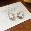 Pendientes de aro pintados en spray con aguja de plata, lujo ligero, de alta gama, modernos y exquisitos, diseño único, accesorios para orejas versátiles y de nicho