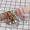 Llavero creativo llavero de cuerda de cuero cordón para llaves colgante de joyería cordón tejido fábrica de cuerda de cuero venta al por mayor
