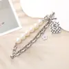 Cuentas como Joyería Nuevo Pulsera de Lazo de Perla Esmerilada DIY Hebilla de Tornillo Funda de Teléfono Móvil de Mujer de Moda Cadena Colgante Anti-Caída Tesoro