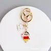 Llavero de dibujos animados estilo japonés Crayon Shin-chan, béisbol, baloncesto, perrito blanco, colgante de aleación, decoración de mochila para parejas, venta al por mayor