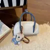 Bolso de mano de nicho de alta gama 2026 nuevo popular súper caliente exquisito para el día a día bolso de hombro bolso cruzado simple moderno
