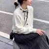 Cárdigan de punto hueco estilo francés con suave lazo, bordes festoneados y cuello redondo, elegante abrigo suéter para mujer