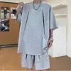 Conjunto de moda de verano nuevo y moderno con diseño de remaches, versátil, holgado, transpirable, conjunto casual de dos piezas de manga corta y shorts