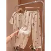 Pijama floral de manga corta estilo bosque para mujer, nuevo conjunto casual holgado de dos piezas con pantalones largos para casa, verano 2026
