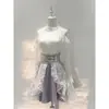En stock: el Comienzo de la Historia - Conjunto de Dos Piezas Pequeño Transparente Estilo Japonés: Top Blanco Asimétrico + Falda Corta de Retazos
