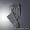 Pantalones casuales de otoño transfronterizos para hombre, corte holgado extragrande, estilo jogger versátil, cómodos para el trabajo y el deporte, pantalones largos