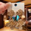 Pendientes de Flor de Atmósfera Exagerada con Viento Frío de Metal de Alta Calidad para Mujer Diseño Retro Pendientes Mismo Estilo que Wang Ziwen