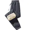 Pantalones casuales gruesos para hombre de cachemira cálida con forro polar, pantalones largos de invierno para hombre, pantalones deportivos con cremallera y bolsillos