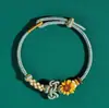 Pulseira do Festival do Barco-Dragão com Flor de Pessegueiro e Nó Wenchang, Pulseira Tecida à Mão de Girassol, um Presente para o Exame de Admissão ao Ensino Médio