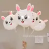 Globo de película de aluminio de dibujos animados sosteniendo 18 pulgadas apertura escolar de jardín de infantes centro comercial 61 juguetes para niños para empujar pequeños regalos