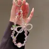 Cadena para Teléfono de Cristal Brillante con Perlas, Sensación de Lujo y Alta Gama, Llavero de Coche con Lazo, Accesorio Colgante para Bolso