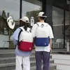 Mochila de color block transfronteriza con tacto de calidad, gran capacidad, adecuada para hombres y mujeres, para ir al trabajo y uso estudiantil, mochila de viaje para exteriores de color block