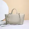 Nuevo bolso de mano para mujer hecho de cuero genuino, bolso de hombro, bolso tote de piel de vaca transfronterizo, bandolera de nicho, cuero suave vintage, gran capacidad