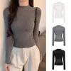 Top de punto hueco semitransparente negro con patchwork para mujer, otoño e invierno, camisa base sexy que ciñe la cintura, top corto ajustado con un diseño elegante