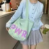 Bolsa Casual Simples de Tecido Grande Capacidade 2025 Nova Coleção Primavera Design de Nicho Bolsa Tote Feminina de Ombro/Axila