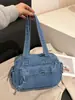 Bolsa Jeans Transfronteiriça para o Dia a Dia Feminina 2026 Novo Estilo Moda Grande Capacidade Nicho Simples Versátil Ombro Único Bolsa de Axila