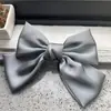 Coreano Ins Color Puro Satén Gasa Lazo Grande Pinza de Primavera Popular Trendy Sombrerería Clip Lateral para Mujer Accesorios para el Cabello Venta al por Mayor