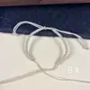 Producto Semi-Terminado de Cuerda de Mano Estilo Xizang Trenzada de Cuatro Hilos DIY Se Puede Ensartar con Cuentas de Transferencia Etiqueta de Mano Pulsera de Hilo de Algodón Estilo Chino