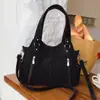 Bolsa de Mão Versátil Nova Outono e Inverno 2025 Bolsa de Ombro Feminina Bolsa Tote de Grande Capacidade para o Dia a Dia Bolsa Transversal Bolsa de Viagem