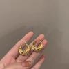 Pendientes con textura de moda, hebilla de oreja, pendientes plisados de metal francés, pendientes circulares sencillos y fríos de alta calidad para mujer