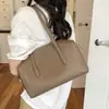 Bolso Cruzado Minimalista Color Sólido Patrón Lichi Baguette para Hombro Modelo Nuevo 2026 Gran Capacidad Versátil Bolso de Hombro de Lujo Ligero