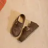 Otoño 2026 Retro Gamuza Punta Redonda Planos Mujer Hebilla Metálica Completamente Cubiertos Slip-ons Suela Suave Casual Viaje Diario