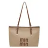 Bolso grande de mujer retro transfronterizo 2026 nueva moda versión coreana bolso tote de nicho para viajes bolso simple de axila