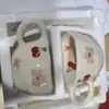 Caneca de cerâmica minimalista pintada à mão com motivos florais e creme, caneca de alto valor para uso doméstico, caneca de chá de verão, caneca criativa