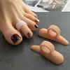 Almofada de dedo do pé com furo único almofada de correção de sobreposição de valgo separador de dedo em martelo deformação por flexão divisor de dedo fábrica de origem