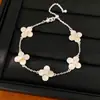Pulsera de flor extraíble de circón y nácar estilo coreano, sensación de lujo ligero de nicho de alta gama, accesorio versátil para el día a día