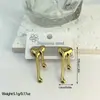 Pendientes geométricos de acero inoxidable a rayas estilo ins transfronterizos europeos y americanos, modernos y versátiles, venta al por mayor de fabricantes de pendientes transfronterizos