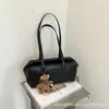 Bolsa de Almofada Casual Retrô Estilo Preguiçoso Bolsa de Braço Feminina 2026 Nova Moda Casual Versátil para o Dia a Dia Bolsa de Mão de Ombro