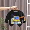 Versión coreana de la primavera y el otoño nuevo cuello redondo dibujos animados bebé estilo occidental suéter de manga larga jeans traje casual fabricantes al por mayor