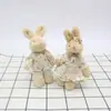 Juguete de peluche pareja conejo de lino muñeca tela de flores articulado Conejo bolsa colgante joyería diy muñeca decorativa conejo