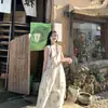 Os Vestidos Tendência e Bonitos para Mulheres Deste Ano São Novos Estilos de Verão com um Estilo Resort Francês e Estampas Deslumbrantes, Vestidos Regata Sem Mangas