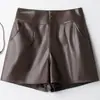 Pantalones cortos de cuero para chicas calientes, pantalones cortos casuales de color liso para usar como prenda exterior, nuevos pantalones de pierna ancha adelgazantes de cintura alta para otoño 2026, versátiles talla grande