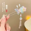 Nuevo pasador de borla estilo chino, fresco y elegante, para mujer; palillo de pelo vintage de alta gama para recogidos; adecuado para cheongsam y Hanfu, con un diseño oscilante