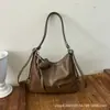 Mochila versátil de moda nueva para otoño 2026 transfronteriza, bolso cruzado de gran capacidad, adecuado para el trabajo y los desplazamientos, con múltiples opciones de transporte, bolso de mujer