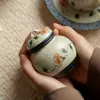 Dinastía Tang y Song Glaseado de Caramelo Camelia Azul Cerámica Pintada a Mano Recipiente Doméstico para Té Accesorios para Ceremonia del Té Tarro Sellado Tarro de Almacenamiento