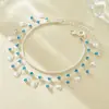 Tornozeleira Empilhável Azul Brilhante Diamante Minimalista de Luxo Leve Japonês e Coreano, Tornozeleira Personalizada de Alto Padrão com Borla de Concha Lagarta