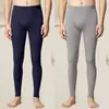 Pantalones cálidos de otoño e invierno para hombre elásticos finos de terciopelo ajustados línea de base interior forrados de forro polar engrosados nueva moda